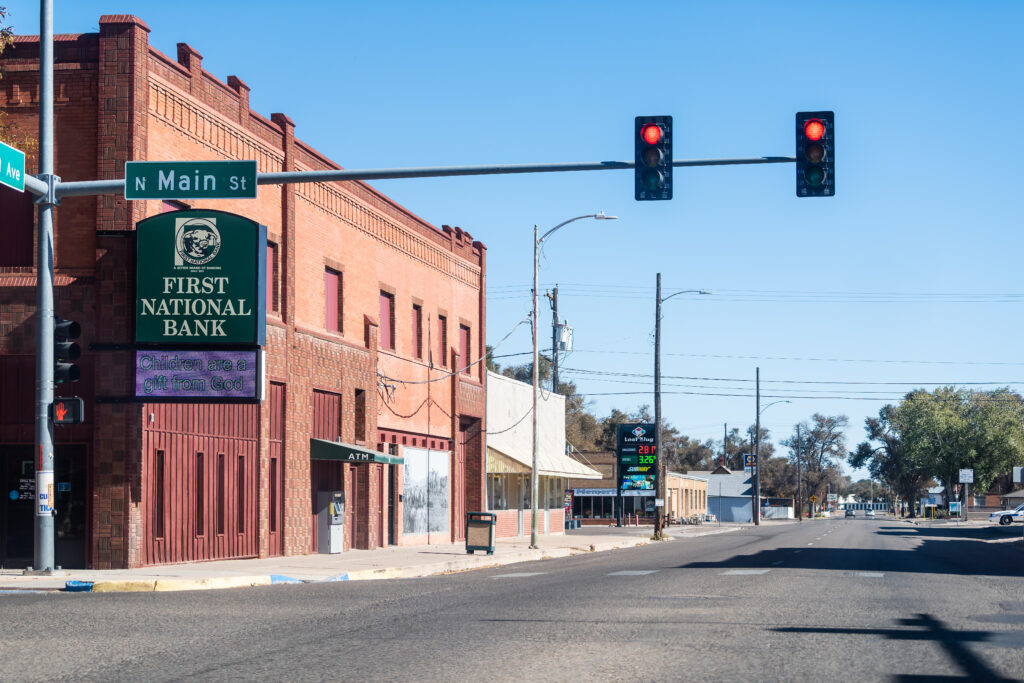 Rocky Ford, Usa October 13, 2019: Small Town In Colorado With Red Light On Main Street Downtown And First National Bank
